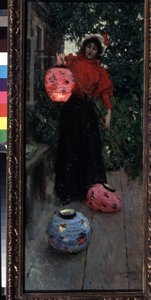 Chinesische Laternen (Eine Frau zündet und installiert Papierlaternen auf der Veranda am Abend)