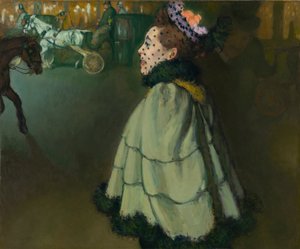 Frau auf den Champs-Élysées bei Nacht