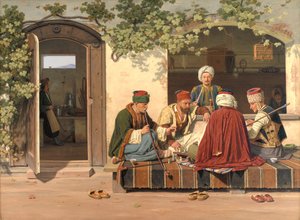 Eine Gruppe von Schachspielern vor einem türkischen Kaffeehaus und Friseursalon