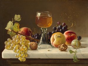 Marmortischplatte mit Obst und Weinglas