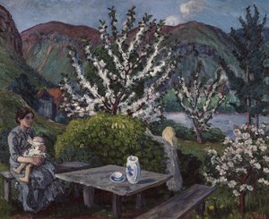 Mutter und Kind am Gartentisch