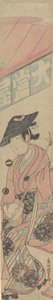 Eine Geisha auf einem Shogi vor einem Teehaus