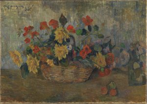 Kapuzinerkresse und Dahlien in einem Korb