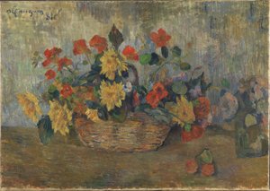 Kapuzinerkresse und Dahlien in einem Korb