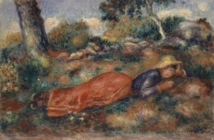Junge Frau im Gras liegend