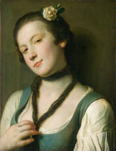 Ein Mädchen mit einer Blume im Haar