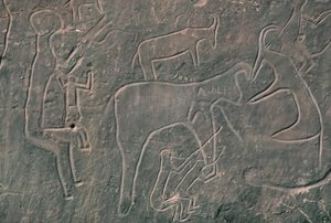 Menschliche Figuren und Tiere (Felsmalerei) von Prehistoric