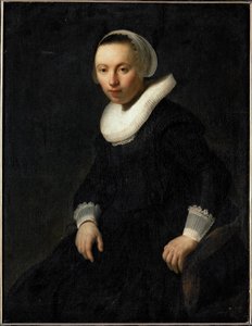 Junge Frau, die in einem Stuhl sitzt von Rembrandt Harmensz. van Rijn