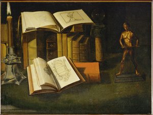 Buch, Kerze und Statuette