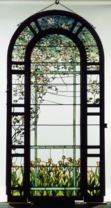 Ein bleiverglastes Gitterfenster, das Clematis-Reben darstellt, frühes 20. Jahrhundert von Studios Tiffany