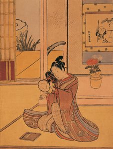 Junger Mann, der die Trommel spielt von Suzuki Harunobu