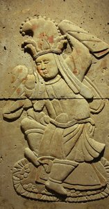 Stele, die einen Musiker darstellt