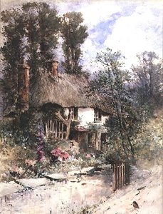 Ein strohgedecktes Cottage im Sommer