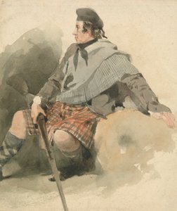 Ein sitzender Highlander