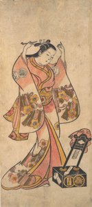 Sanjo Kantaro als Frau, die sich vor einem Lackspiegel die Haare richtet, vor 1763 von Torii Kiyomasu II.