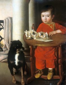 Ein Junge mit Spielzeug