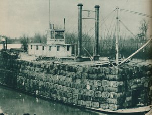 Eine volle Ladung Baumwolle ragt oft hoch über die Decks der Mississippi-Dampfschiffe, 1937 von Unbekannt