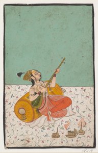 Dame spielt Sitar
