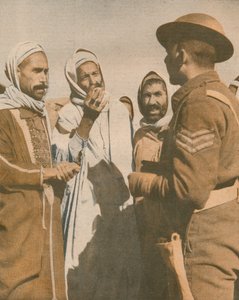 Tunesische Araber begrüßen einen britischen Sergeant in Chaouach, 1943 von Unbekannt