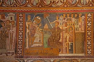 Kaiser Konstantin überreicht Papst Silvester seine kaiserliche Tiara und gibt ihm die Herrschaft über Rom, Westwand der Kapelle San Silvestro, 1246 von Unknown