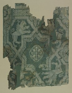 Fragment mit Sternmuster und Greifen