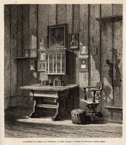 Martin Luthers Zimmer (1483-1546) auf der Wartburg, wo er nach seiner Exkommunikation im Jahr 1521 Zuflucht fand, mit seinem Porträt und denen seiner Eltern über dem Schreibtisch, unter deren Augen er die Bibel ins Deutsche übersetzte und seine berühmteste von Unknown artist