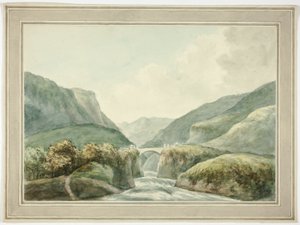 Bergstadt bei Brücke über Stromschnellen