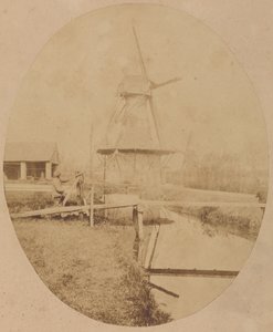 [Maler mit Hut an der Staffelei, der eine Windmühle malt] von Unknown artist