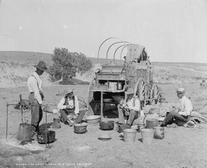 Camp-Wagen bei einer Viehherde in Texas, ca. 1900 (s/w Foto)