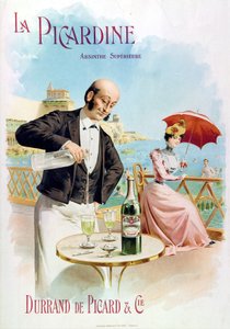 Ein Kellner bereitet ein Glas Absinth vor