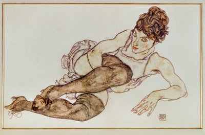 Frau mit braunen Strümpfen von Egon Schiele