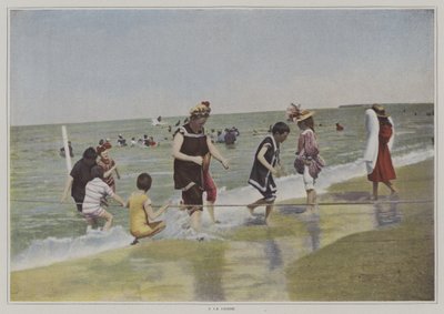 Kinder spielen mit einem Seil am Strand (Farbfoto) von French Photographer