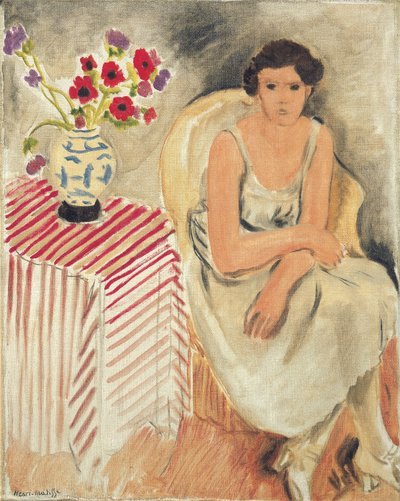 Frau auf einem Stuhl - Blumen auf dem Tisch, oder Nelken von Henri Matisse