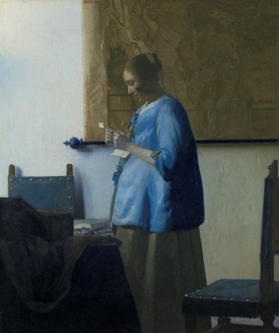 Frau in Blau, die einen Brief liest von Johannes Vermeer
