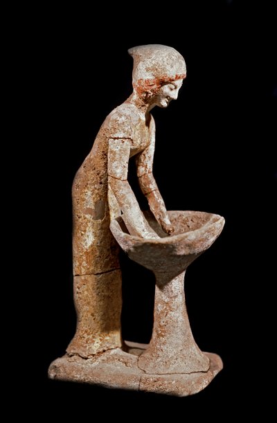 Mykenische Kunst: Figur einer Frau, die Mehl mahlt. 16. Jahrhundert v. Chr. Straßburg, Archäologisches Museum von Mycenaean