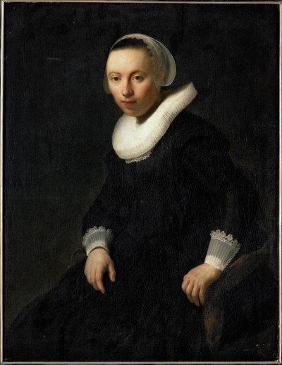 Junge Frau, die in einem Stuhl sitzt von Rembrandt Harmensz. van Rijn