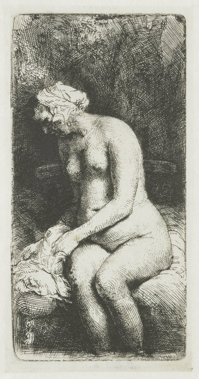 Frau, die ihre Füße an einem Bach badet von Rembrandt van Rijn