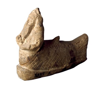 Sumerische Zivilisation: Terrakotta-Statuette eines Schutzgeistes in Form eines Fischmenschen, unter den Fundamenten eines Hauses platziert. 8.-7. Jahrhundert v. Chr. Höhe 12x9,7 cm Bagdad, Nationales Irak-Museum von Sumerian Sumerian