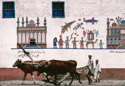 Gemaltes Wandbild auf einer Stuckwand eines Bauernhauses in Luxor erinnert an die frühen Jahre des Bauern von Thomas J. Abercrombie
