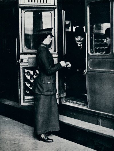Eine Fahrkartenkontrolleurin bei der Arbeit von Unbekannt