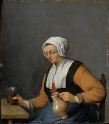 Eine Frau mit einem Bierkrug