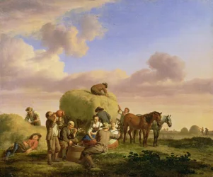 Heuarbeiter ruhen sich auf einem Feld aus
