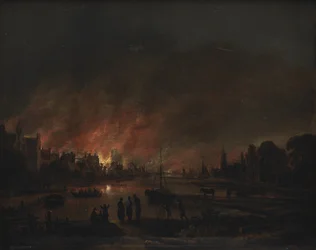 Feuer in einem Dorf bei Nacht