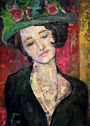 Elegante Frau mit grünem Hut