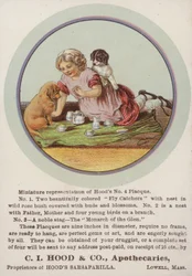Mädchen sitzt auf Decke mit Welpen