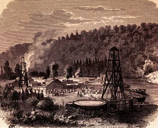 Ölfelder in Titusville, Pennsylvania, mit dem ersten Bohrturm, erfunden von Edwin Laurentine Drake im Jahr 1859, Kupferstich, USA