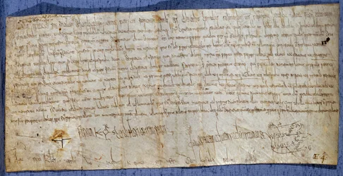 Urkunde von König Karl dem Großen (742-814), die die Abtei Saint Denis von Mautgebühren während der Messe befreit. Ende des 8. Jahrhunderts. Paris, Nationalarchiv