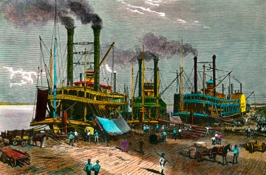 Verladung von Baumwolle auf Dampfschiffe am Mississippi für New Orleans. Gravur des 19. Jahrhunderts. Private Sammlung