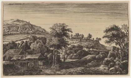 Wassermühle am Fuße eines Hügels