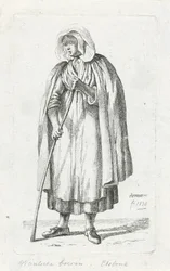 Frau mit einem Umhang und einem Stock